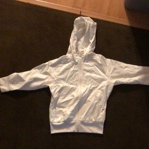 Nike short sleeve wind breaker. White. Small.